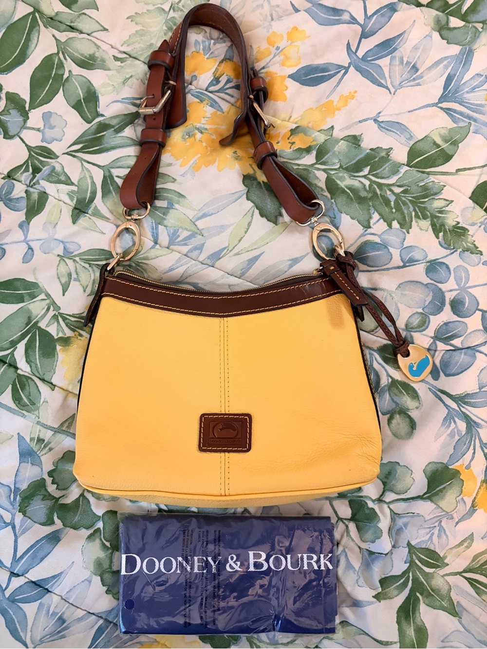 Dooney & Bourke Yellow Leather Shoulder Bag with Brown Trim and Adjustable Strap